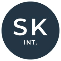 Dark blue circle with 'SK Int.' written inside
